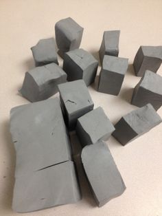 there are many cement blocks on the table