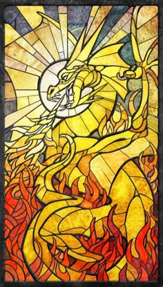 a stained glass window with a dragon on it's face and flames in the background