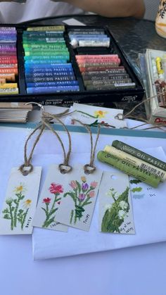 some cards and crayons on a table