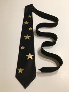 "High quality necktie. Great material. Very durable. 3.2'' at the widest point, 58\" long from tip to tip. Adult necktie. If you need something added or changed feel free to message me. Custom designs are welcome, I will do my best to make it on a tie, no set up fee for custom graphic. You pay only if you approve the final look on the tie. I try to ship the next business with USPS First Class Shipping which takes 3-5 days to arrive. If you order more then 3 ties I will ship Priority Mail 2-3 day Adjustable Party Ties For Father's Day, Gold Adjustable Suit And Tie Accessories For Party, Father's Day Party Ties, Star Tie, Funny Ties, Cool Ties, Custom Ties, Golden Star, Wedding Christmas