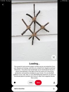 an image of a snowflake made out of sticks on the side of a building