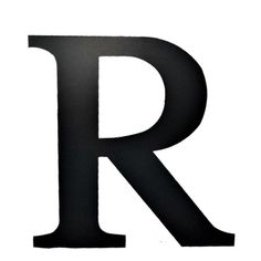 the letter r is made out of black paper