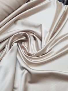 "Beige champagne color fine satin fabric. Usable for apparel,accessories and interior designing. Beautifully made to use for costumes, decorations, weddings and much more. Width : 60\" inches Color : Khaki / Beige /champagne Content : Polyester Thank you for your coming! Please read policy before placing an order. Please contact us via ETSY Conversations for more details. Fabrics are sold by the yard. We will continue length of multiple yards . It will come in one piece of the multiple yards you 10th Anniversary Idea, Champagne Color Palette, Beige Champagne, Cmf Design, Dress Lining, Interior Designing, Silk Taffeta, Fabric Suppliers