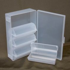 an open plastic storage box on a table