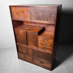 an old wooden desk with two drawers