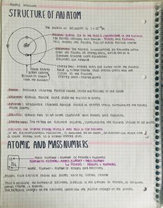 the structure of an atomic and mass numbers notebook with handwritten notes on it,