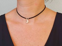 Handmade necklace with a layer of faux suede and a stainless steel moon charm. The high-grade stainless steel beads, chain and findings are hypoallergenic, durable, and won't tarnish. 2 options of lengths: Choker: 34cm + 7cm extender chain. Total length is 41cm. Necklace: 40cm + 7cm extender chain. Total length is 47cm. If you want a different length please leave a note during checkout so I can make it especially for you! Charm size: approximately 10mm Every item will always be gift-wrapped in a Moon Choker Necklace, Boho Choker Necklace, Crescent Moon Necklace Gold, Moon Choker, Zodiac Bracelet, Silver Choker Necklace, Layered Chokers, Boho Choker, Mermaid Necklace