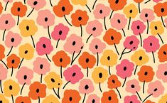 an orange and pink flower pattern with black dots on the bottom half of the image