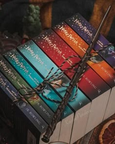 a stack of harry potter books sitting on top of each other