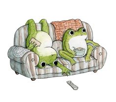 two green frogs sitting on a couch with their legs crossed and one is holding a remote control