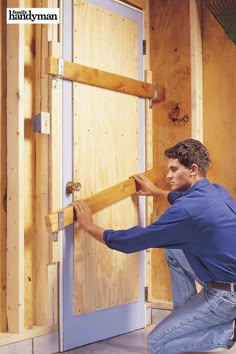 a man is working on a door frame