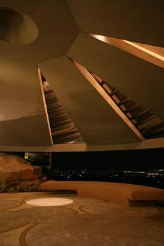 the interior of a modern building at night