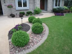 a house with landscaping in the front yard