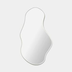 a white mirror with a curved edge