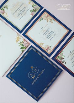 wedding stationery with blue and gold trimmings on the front, back and sides