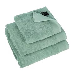 two towels folded on top of each other in mint green color with black label and white background