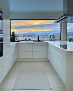 White kitchen 
White counter top with stainless steel appliances and beautiful blue view
Candles 
Minimal decor Kitchen Design Modern, White Kitchen Decor, Paint Modern, Modern House Exterior Design, House Exterior Design, Modern House Exterior Colors