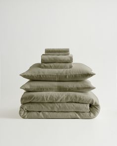 four pillows stacked on top of each other