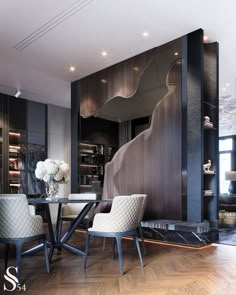 an elegant dining room with black and white decor on the walls, wood flooring