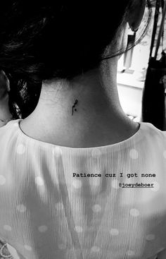 a woman with a tattoo on her neck saying,'i am not sure what to do