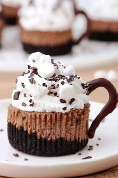 there is a cupcake with whipped cream and chocolate on it