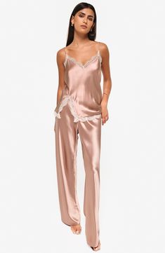 Fall for the sleek silhouette of these night-out pants designed with a high waist and crafted from glossy satin. 31" inseam; 21 1/2" leg opening; 11 1/2" front rise (size Small) Unlined 73% acetate, 27% polyester Dry clean Imported Elegant High-cut Leg Pants For Night Out, Fitted Pants With Sheen For Night Out, Elegant Sheen Bottoms For Party, Elegant Party Bottoms With Sheen, Sleek Satin Pants, Chic Sheen Pants For Night Out, Chic Pants With Sheen For Night Out, Evening Satin Straight Leg Bottoms, Satin Pants For Evening