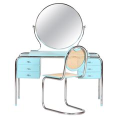 a blue vanity with a mirror and chair on top of it, in front of a white background