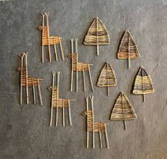 several sticks are arranged in the shape of giraffes