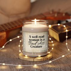 "Looking for the perfect gift for the woman who loves to read?  These immersive aromas come in 5 delightful scents, from soft floral to baking spices there is something for everyone. It would be the perfect conversation starter, but really she prefers silence and a good book over company!  🖊️Materials: 100% natural soy wax blend, 100% cotton wick and a re-usable glass jar 🖊️ Non-toxic. It contains no lead, plastics, parabens, synthetic dyes, or phthalates 🖊️ One size: 2.8″ × 3.5\" (7.1cm × 8. Teacher Candle, Cotton Blossom, Funny Candles, Apple Harvest, Personalized Candles, Soy Wax Candle, Scented Soy Candles, Wax Candle