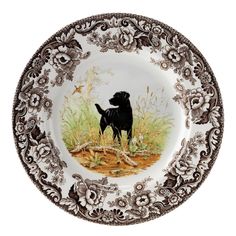 a plate with a black dog on it