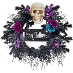 a halloween wreath with a skull and purple flowers on it is featured against a white background