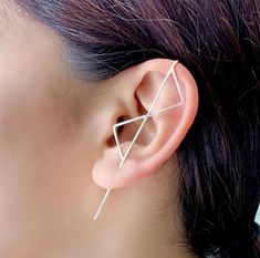 These striking Sterling Silver ear cuffs take earring design to another dimension. Handcrafted, the double kite design has a great geometric profile, and we offer two lengths  to suit different ear sizes, as well as offering this style as a single earring or as a pair. The ear pin also comes in Sterling Silver, 18kt Gold or Rose Gold plated, or in a gunmetal finish oxidized Sterling Silver. A great earrings style for those looking for unusual or unique earrings. Made from: Sterling silver. Measu Third Piercing, Ear Pins Earrings, Double Triangle, Silver Ear Climbers, Edgy Earrings, Ring Man, Ear Climbers Earrings, Banda Aceh, Ear Climber