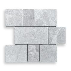 some white marble tiles on a white background