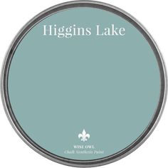 a blue tin with the words higgins lake on it