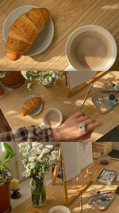 there is a person holding a piece of paper near some plates and cups on the table