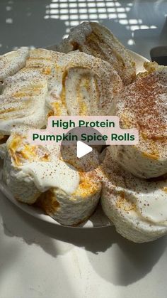 a white plate topped with pumpkin spice rolls