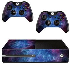 an image of a video game console with two controllers in front of the space background