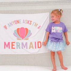 The Mermaid Patch Short Sleeve T-Shirt for kids is a fun and festive t-shirt for any mermaid celebration or everyday wear! Features: Shirt Color: Lavender Patch Color: Multicolor chenille with silver glitter outline Material: 100% Cotton Features: Tagless inside neck label for an itch-free wear Fit: Toddler Unisex; True to Size Care: Machine washable, wash inside out, lay flat to dry, wash with like colors Each t-shirt is hand pressed with love in our hometown warehouse. Silver Glitter, Inside Out, Lavender, Mermaid, Colorful Shirts, T Shirt