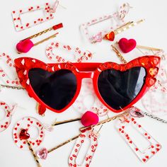 Rock and Roll HEART SHAPED SUNGLASSES with the cutest heart and rhinestone details. Retro Vintage Style HEARTBREAKER 1970s Beveled Heart Shaped Oversized Sunglasses  Best part, they have UV protection!   It's time to party! These sunglasses are perfect for any bachelorette party, wedding shower, engagement party or bridal shower! Also, great to pair with your red outfit for your favorite music festival, black leather jacket for your favorite rock concert or of course, to Lana Del Rey Custom Red Luxury Red Elegant Sunglasses, Cute Party Sunglasses With Heart Print, Cute Heart Print Sunglasses For Party, Cute Red Party Sunglasses, Fun Party Sunglasses With Heart Print, Heart-shaped Sunglasses With Heart Print For Party, Fun Heart Print Party Sunglasses, Heart-shaped Party Sunglasses With Heart Print, Cute Heart Print Sunglasses For Valentine's Day