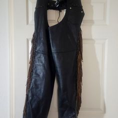 Genuine Leather Heavyweight Chaps. Size 2xs. Made To Fit Me At 5'4", Zip Up Sides, Snap At Ankles, Buckle And Lace Adjustable Waist. Excellent Condition. These Are Thick Heavy Duty Riding Chaps. Leather Chaps, Riding Chaps, Black And Brown, Zip Ups, Heavy Duty, Genuine Leather, Buckle, Lace, Leather