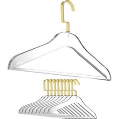 a set of clothes hangers with gold clips on each side and one hanging from the top