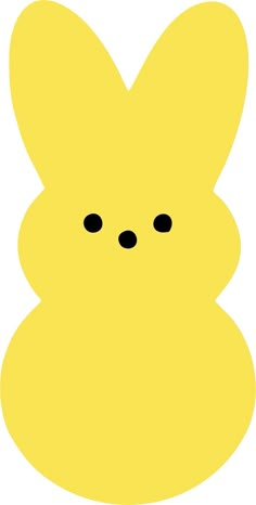 a yellow bunny face with black eyes