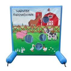 an inflatable game with farm animals on it