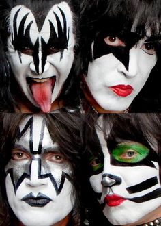 four people with their faces painted white and black