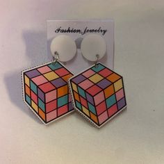 Rubix Cube Earrings Nwt Retro White Earrings For Gift, Modern White Clip-on Earrings For Gift, Trendy White Drop Clip-on Earrings, Retro White Dangle Earrings, Retro Geometric Jewelry Gift, Retro Geometric Jewelry For Gifts, Retro White Clip-on Earrings As Gift, White Retro Clip-on Earrings As Gift, Retro White Drop Earrings