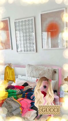 a doll sitting on top of a bed next to a mirror