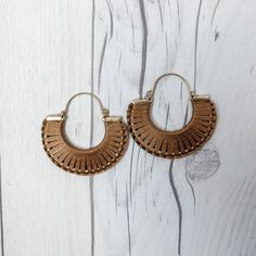 Crescent Hoop Earrings | Boho Earrings | Thread Wrapped Earrings | Boho Jewelry | Half Circle Hoop Earrings | Statement Earrings A a thread wrapped half circle hoop. The thread comes in black, gray, or light tan. Length: 21 1/2 inches Width: 2 inches S O C I A L * M E D I A Follow us on Instagram: https://www.instagram.com/_andkatedesigns/ Y O U * M A Y * A L S O * L I K E To See Our Entire Shop: https://www.etsy.com/shop/andKateDesigns Summer Hoop Earrings With Ear Wire, Handmade Metal Hoop Earrings For Summer, Brown Metal Hoop Jewelry, Everyday Bohemian Hoop Earrings, Everyday Brown Metal Earrings, Everyday Handmade Metal Hoop Earrings, Handmade Brown Metal Hoop Earrings, Nickel-free Brown Metal Hoop Earrings, Everyday Small Hoop Bohemian Earrings