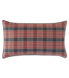 an orange plaid pillow on a white background with a black and red border around it