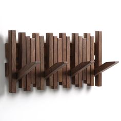 a wall sculpture made out of wooden planks