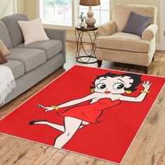 a living room area rug with a cartoon character on the floor and furniture in the background